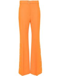 Patou - Button-hem Flared Wool Trousers - Lyst