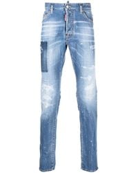 DSquared² - Logo-Print Light-Wash Jeans - Lyst