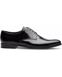 Prada - Zapatos derby de piel - Lyst