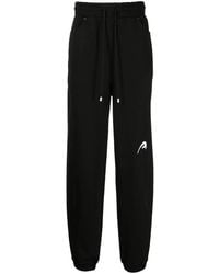 Adererror - Logo-Embroidered Cotton Drawstring Trousers - Lyst