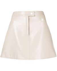 Courreges - Logo-appliqué High-waisted Mini Skirt - Lyst