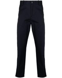 Moncler - Logo-patch Tapered-leg Trousers - Lyst