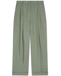 Dries Van Noten - Pleated Pinstripe Trousers - Lyst