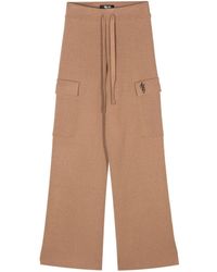 Amiri - Logo-embroidered Ribbed Trousers - Lyst