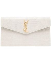 Uptown leather clutch bag Saint Laurent White in Leather - 32827617