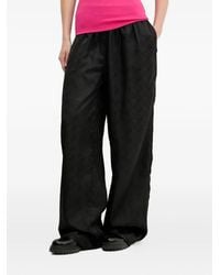HUGO - Broek Met Wijde Pijpen En Logoplakkaat - Lyst
