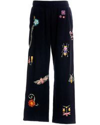 Agua Bendita - Pantalones con bordado floral - Lyst