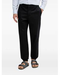 ARMANI EXCHANGE - Monogram-Pattern Elasticated-Cuff Trousers - Lyst