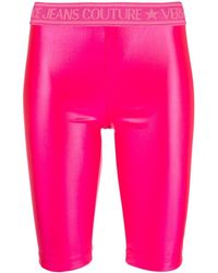 Versace - Logo-waistband Short leggings - Lyst