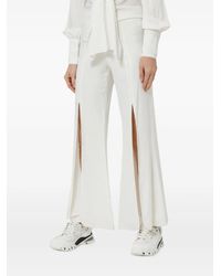 Alexis - Flared Trousers - Lyst