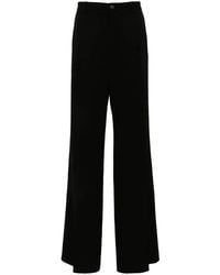 Balenciaga - Pantalones con cierre de botón - Lyst