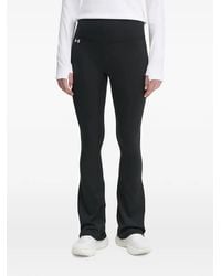 Under Armour - Motion Logo-Print Flared Leggings - Lyst