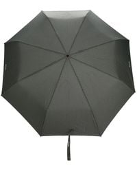 Moschino - Pinstriped Logo-Print Compact Umbrella - Lyst