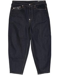 Evisu - Tapered-leg Logo-embroidered Jeans - Lyst