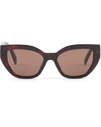 Prada - Logo-plaque Cat-eye Sunglasses - Lyst