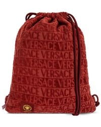Versace - Logo-Jacquard Drawstring Backpack - Lyst