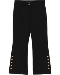 Cambio - Pantalones acampanados con detalle de botones - Lyst