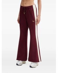 PUMA - Side-Stripe Flared Track Pants - Lyst