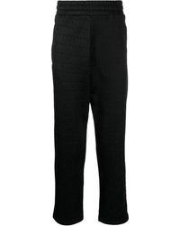 Moschino - Logo-Print Trousers - Lyst