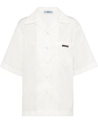 Prada - Oversized Branded-tab Recycled-nylon Shirt - Lyst