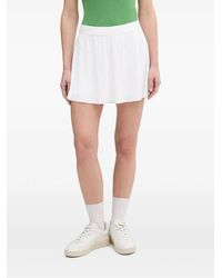 Lacoste - Logo-Patch A-Line Mini Skirt - Lyst