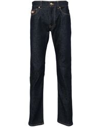 Versace - Mid-Rise Slim Cotton Jeans - Lyst