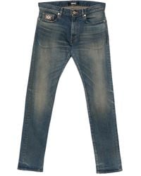 Versace - Vaqueros Medusa - Lyst