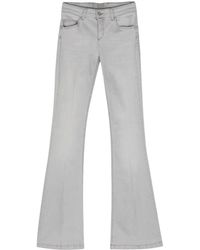 Liu Jo - Low-rise Flared Washed Jeans - Lyst