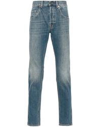 Gucci - Tapered-Jeans mit Logo - Lyst