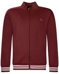 New Balance - Chaqueta con parche del logo y cremallera - Lyst