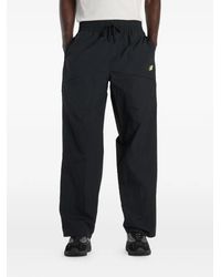 New Balance - Castlefield Woven Trousers - Lyst