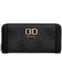 Guess - Logo Patterned Zip Wallet - Lyst