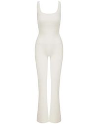 AMADAWEAR - Anastasia Flare-Leg Open-Back Jumpsuit - Lyst