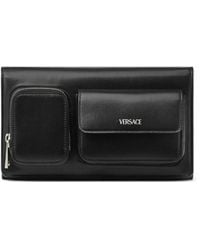 Versace - Logo-stamp Leather Clutch Bag - Lyst
