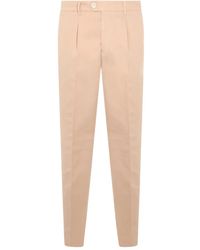 Brunello Cucinelli - Buttoned Pleated Trousers - Lyst