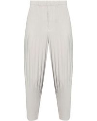 Homme Plissé Issey Miyake - Pantalones ajustados con diseño plisado - Lyst