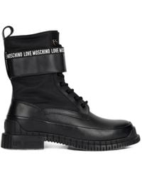 Love Moschino - Logo-Print Lace-Up Ankle Boots - Lyst