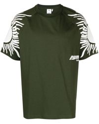 PUMA - X PLEASURES T-Shirt mit Sonnen-Print - Lyst