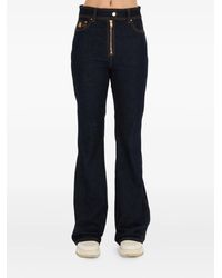Amiri - Flared Jeans Met Gouden Rits - Lyst
