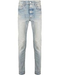 Amiri - Jeans skinny con applicazione - Lyst
