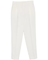 Moschino - Pleated Tapered Trousers - Lyst