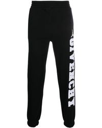 Givenchy - Logo-appliqué Track Pants - Lyst