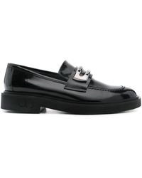 Casadei - Mocasines con placa del logo - Lyst
