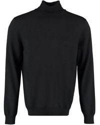 THE (Alphabet) - Jersey de lana con cuello alto - Lyst