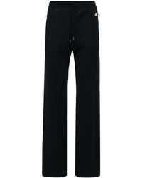 Courreges - Logo-Patch Interlock Track Pants - Lyst