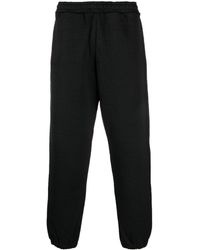Moschino - Logo-pattern Elasticated-waistband Track Pants - Lyst