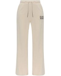EA7 - Pantalones de chándal con logo en relieve - Lyst