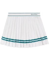 Sporty & Rich - Pleated Stripe Mini Skirt - Lyst