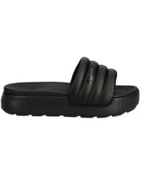 PUMA - Claquettes Karmen Puffy À Plaque Logo - Lyst
