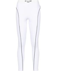 Moschino - Piped-trim Performance leggings - Lyst